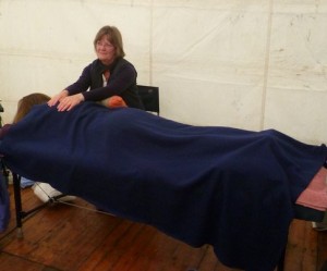 Reiki treatment in progress, in the Complementary Therapies Marquee at Traquair Fayre 2011